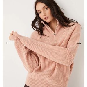 The half-zip mockneck sweater in peach pink